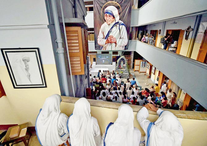 Nuns of Missionaries of Charity watch the live telecast in Kolkata. Pic  PTI