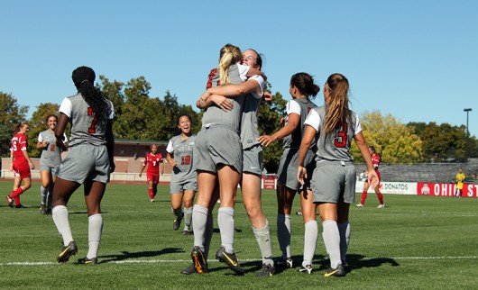 OSU women’s soccer players celebrate during a game against Indiana on Sept. 26 2014. Credit Lantern File