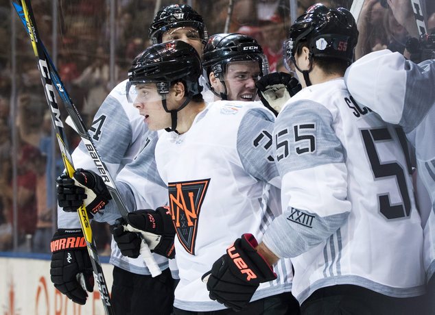 Team North America's Auston Matthews celebrates with teammates after scoring against Sweden during the first period of a World Cup of Hockey game in Toronto