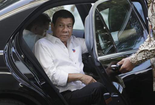 Duterte sit beside Russian PM on ASEAN summit