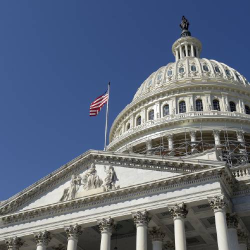 American flag flies over Capitol Hill in Washington. A group of six Gulf Arab countries expressed'deep concern Monday over a bill passed by the U.S. Congress that would allow families of Sept