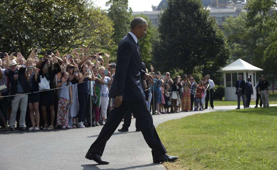 President Barack Obama walks towards Marine One on the South Lawn of the White House in Washington Wednesday Aug. 31 2016. Obama is leaving for his last trip to Asia as U.S. president with stops in China and Laos