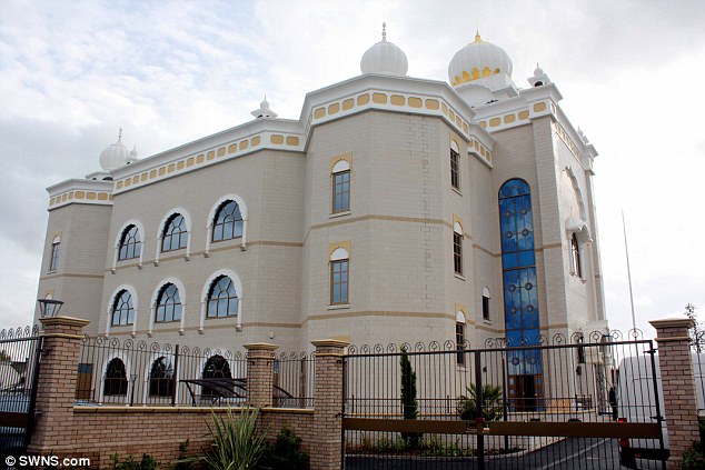 Officers descended on Gurdwara Temple in Leamington Spa after men stormed the building