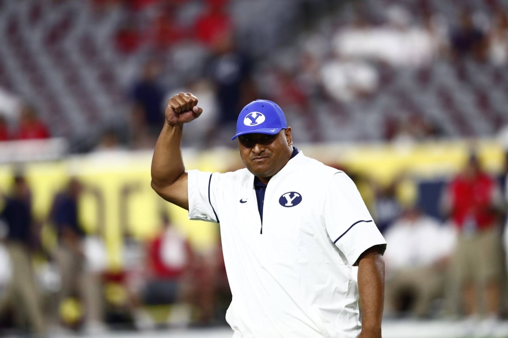 First-year head coach Kalani Sitake celebrates the game-winning field goal Saturday night BYU vs. Arizona Glendale Ariz. Sept. 3 2016