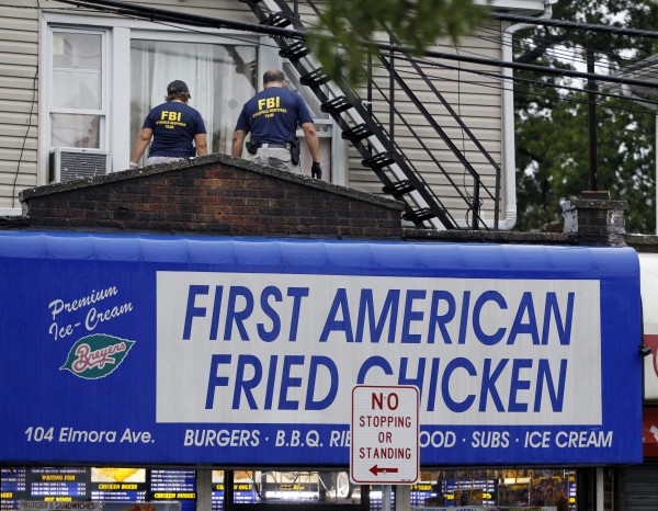 FBI officers during the search of an apartment that is tied to Ahmad Khan Rahami