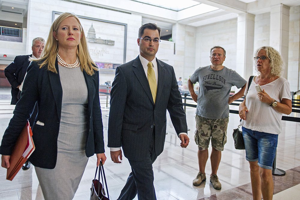 Bryan Pagliano center a former State Department employee who helped set up and maintain a private email server used by Hillary Rodham Clinton departs Capitol Hill on Sept. 10 2015. He refused to appear Tuesday before the Oversight and Government Refor