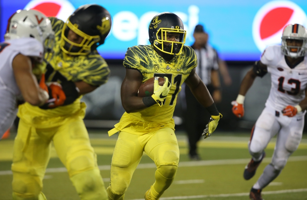 Oregon running back Royce Freeman runs against Virginia during the second half of an NCAA college football game in Eugene Ore. Freeman got his season rolling last weekend by going over 200 yards in a victory ove