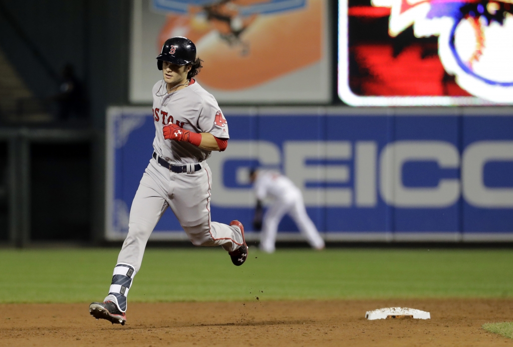 Boston Red Sox's Andrew Benintendi rounds the bases after hitting a three-run home run in the sixth inning of a baseball game against the Baltimore Orioles in Baltimore Wednesday Sept. 21 2016