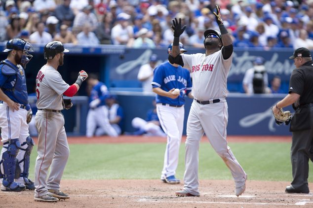 Boston Red Sox designated hitter David Ortiz looks skyward following his three-run homer in the 6th inning during American League baseball action agains