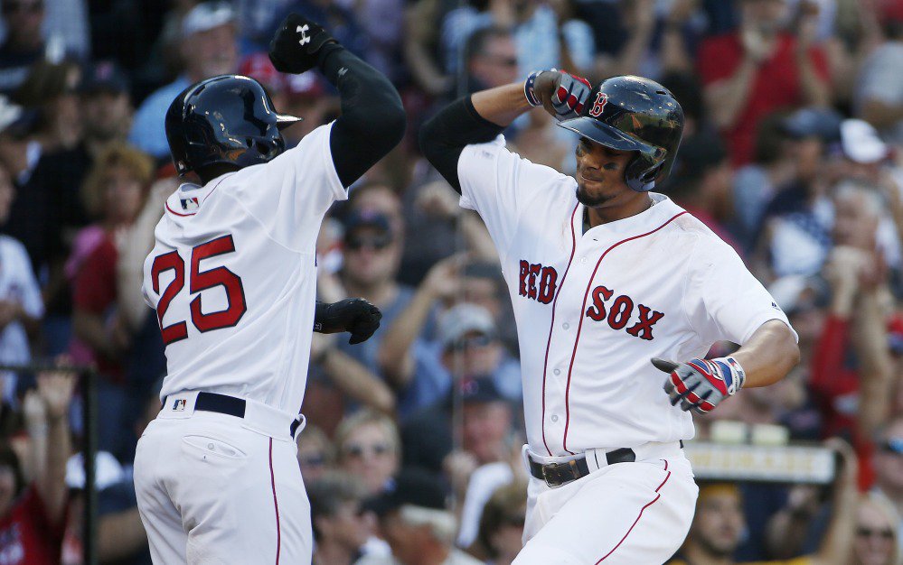 Boston's Xander Bogaerts right with Jackie Bradley Jr. after hitting a two-run home run in the fifth inning of the Red Sox 6-5 win over the Yankees in Boston