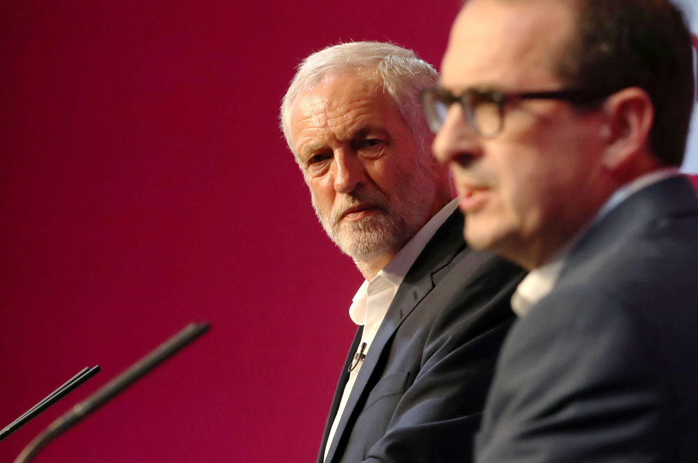 Owen Smith right says he will ‘loyally serve Labour’ from the backbenches if Jeremy Corbyn is declared leader on SaturdayReuters