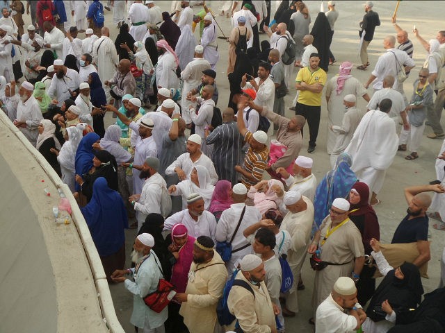 MECCA SAUDI ARABIA- SEPTEMBER 26 Prospective pilgrims stone the devil as part of the annual Islamic Hajj pilgrimage during the third day of Eid Al Adha in Mecca Saudi Arabia