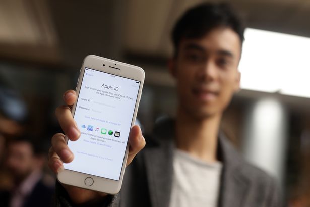 One of the first customers Hieu Pham with his new iPhone 7 at the Apple store in Covent Garden London