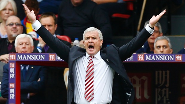 PETER CZIBORRA  REUTERS 
 
   Stoke City manager Mark Hughes has been fined £8000 for an angry reaction to the ref