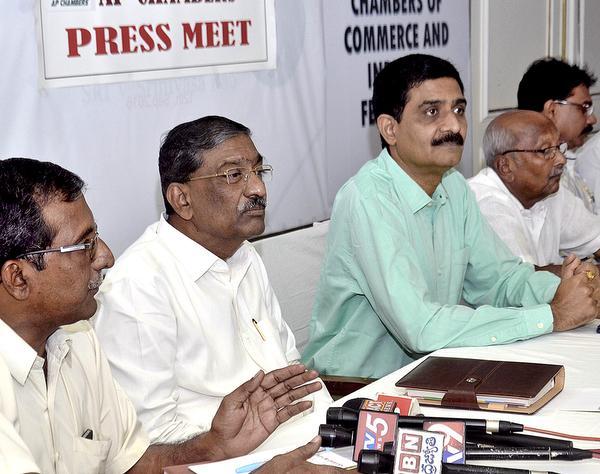 Members of various industry associations addressing a press conference on'Special Status in Vijayawada on Tuesday