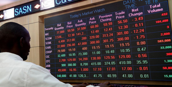 An investors follows stocks on NSE