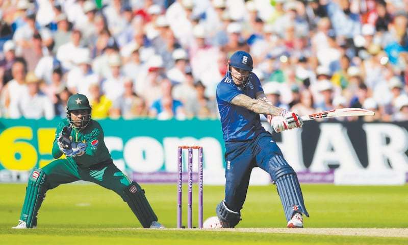 NOTTINGHAM England opener Alex Hales strikes another powerful blow during his career-best innings of 171 as Pakistan wicket-keeper Sarfraz Ahmed looks on haplessly in the third One-day International at Trent Bridge on Tuesday.—Reuters