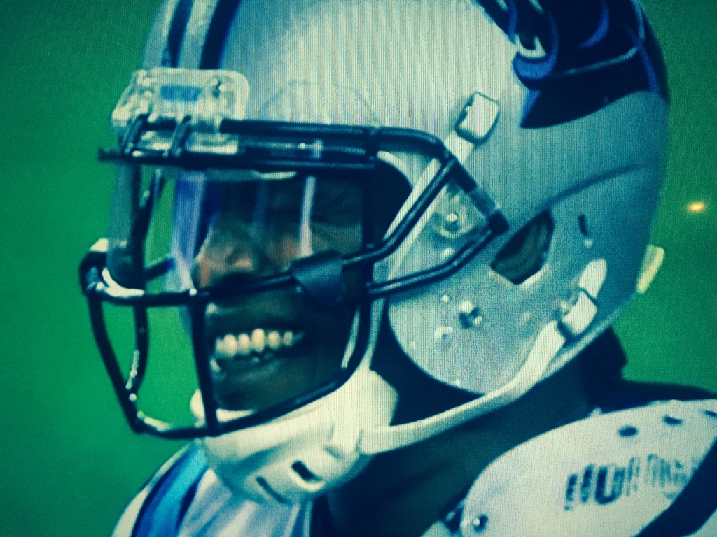 Cam Newton face after hit