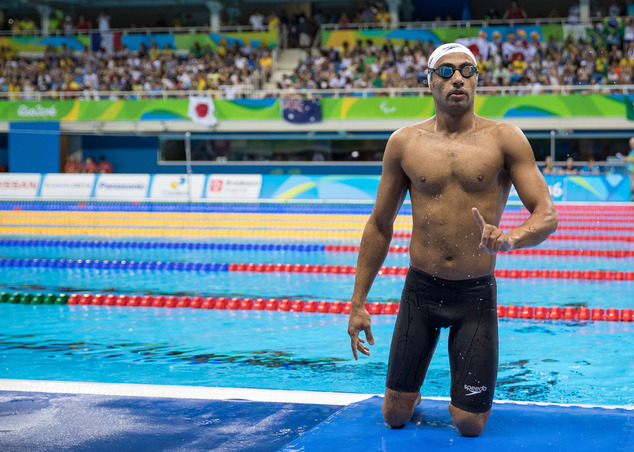 Syrian refugee Ibrahim Al Hussein of the Independent Paralympic Athletes walks out of the pool after competing in heat 1 of the men's 50-meter freestyle- S9