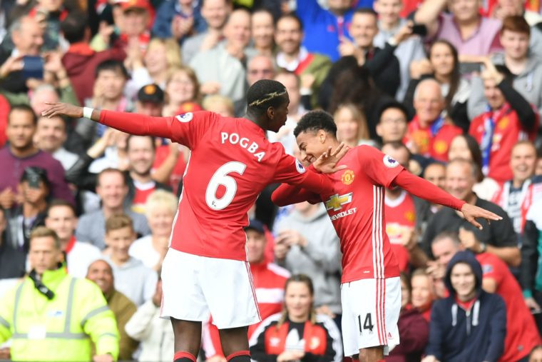 Party time Paul Pogba celebrates his goal and United's fourth with Jesse Lingard at Old Trafford