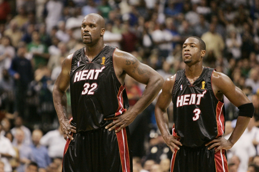 Miami Heat's Shaquille O'Neal and Dwyane Wade show their dejection in the fourth quarter against the Dallas Mavericks in Game 2 of the NBA basketball finals in Dallas Sunday