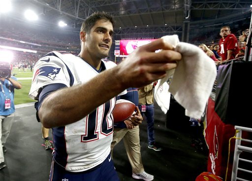 New England Patriots quarterback Jimmy Garoppolo leaves the field after an NFL football game against the Arizona Cardinals Sunday Sept. 11 2016 in Glendale Ariz. The Patriots won 23-21