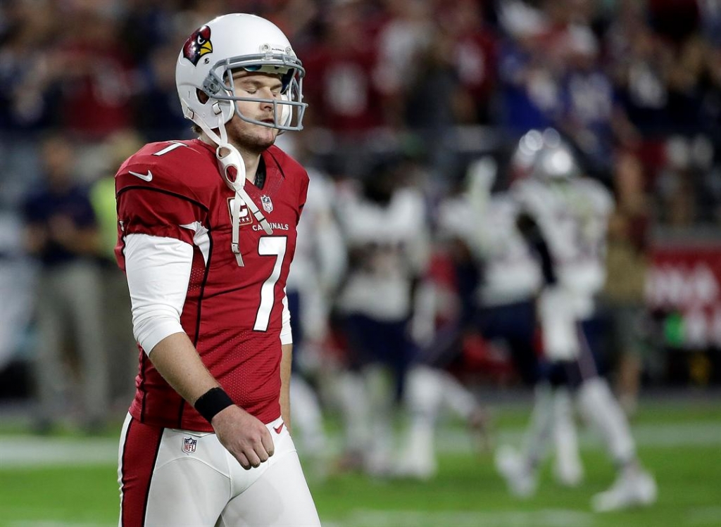 Arizona Cardinals kicker Chandler Catanzaro walks off the field after missing a game winning field goal attempt against the New England Patriots. The Patriots won 23-21