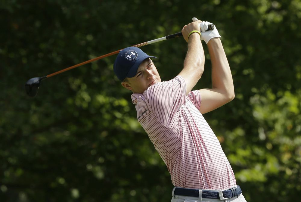 Jordan Spieth watches his tee shot on the fourth hole during the third round of the Deutsche Bank Championship golf tournament Sunday Sept. 4 2016 in Norton Mass