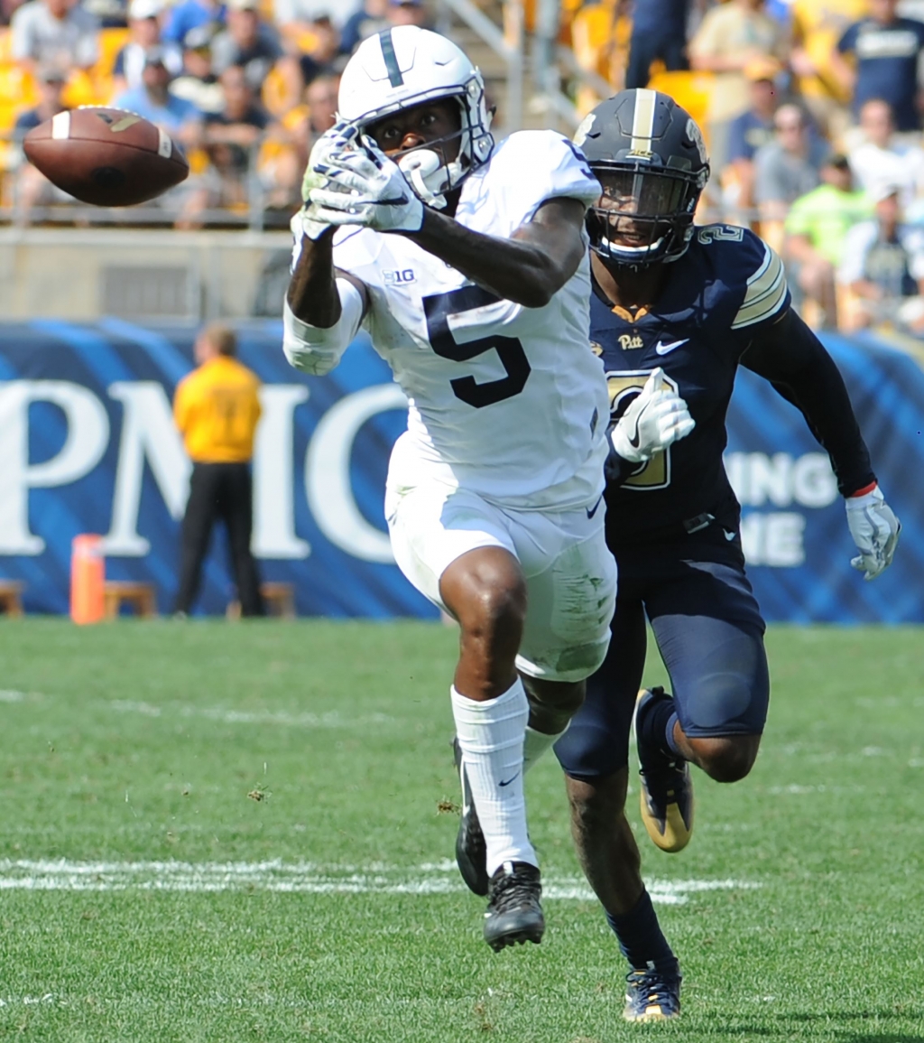 20160910hmnPittPSU-9-4 Penn State’s Dae Sean Hamilton can't hang on to the ball during the game against Pitt at Heinz Field Saturday. Pitt won 42-39