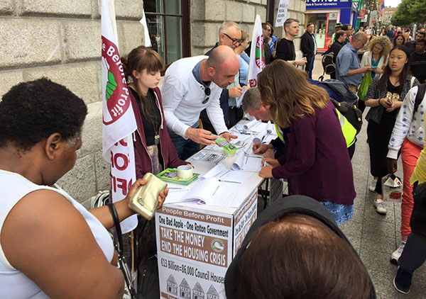 People Before Profit activists petitioning in Dublin demand the government collects the money that Apple owes