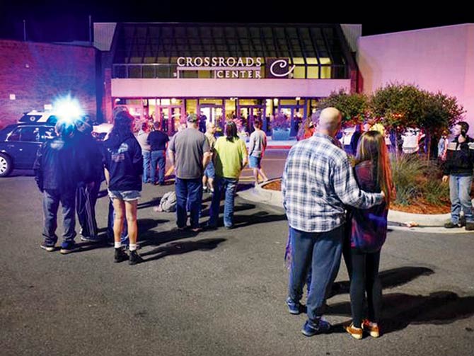 People near the entrance of Crossroads Center mall. Pic  AFP