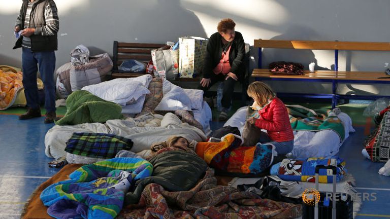 People rest following an earthquake in Amatrice central Italy.
REUTERS  Ciro De Luca