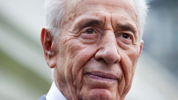 Peres speaks to the media outside the White House in Washington following his meeting with