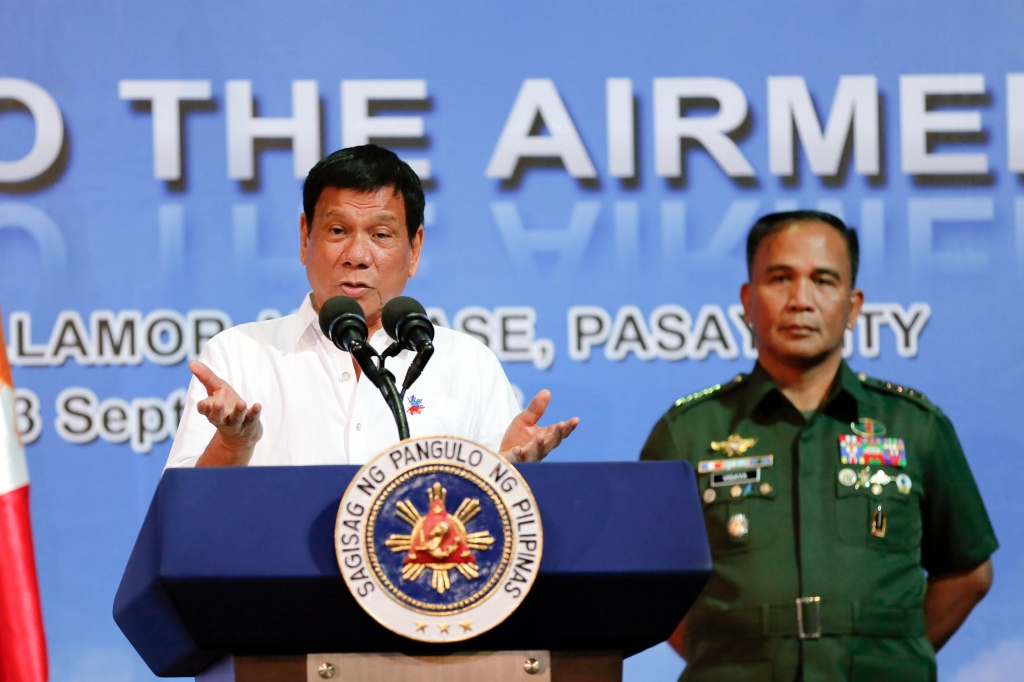 President Rodrigo'Rody Duterte delivering his speech before airmen at the Villamor Air Base in Pasay City on Sept. 13 2016. Beside him is Armed Forces of the Philippines Chief of Staff Gen. Ricrdo Visaya