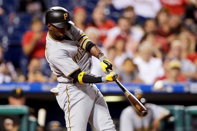 Pittsburgh Pirates&#39 Andrew Mc Cutchen hits a home run off Philadelphia Phillies starting pitcher Jake Thompson during the fourth inning of a baseball game Wednesday Sept. 14 2016 in Philadelphia