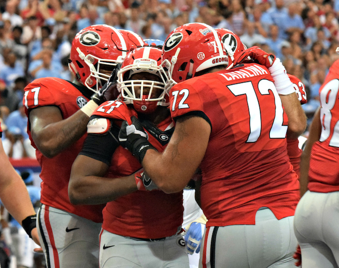 UGA Athletic Association Nick Chubb and teammates celebrate a touchdown against North Carolina Saturday