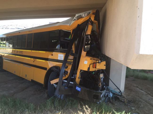 School bus crash kills driver and injures 20 at Denver Airport