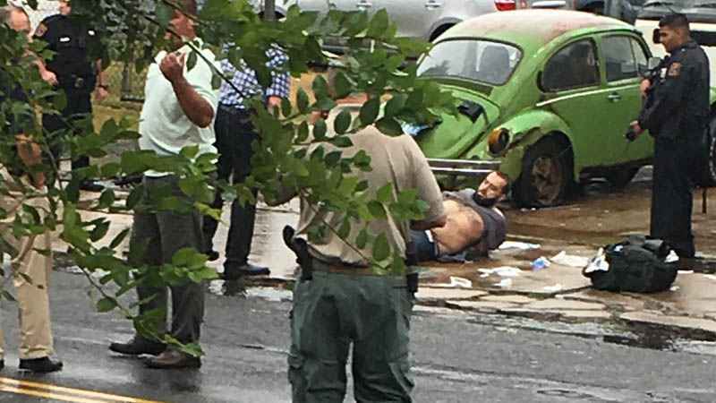 Ahmad Khan Rahami is taken into custody after a shootout with police Monday Sept. 19 2016 in Linden N.J