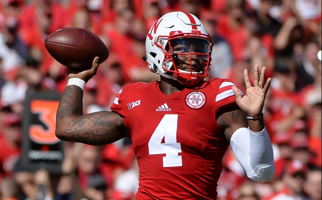 LINCOLN NE- SEPTEMBER 10 Quarterback Tommy Armstrong Jr. #4 of the Nebraska Cornhuskers passes against the Wyoming Cowboys at Memorial Stadium