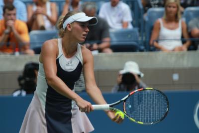 Caroline Wozniacki was rock solid again on Tuesday night jumping ahead early and taking advantage of a hobbled Anastasija Sevastova to advance to the U.S. Open semifinals with a 6-0 6-2 victory inside Arthur Ashe Stadium