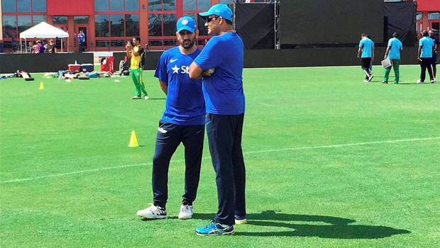 Captain Mahendra Singh Dhoni and coach Anil Kumble have a brief chat ahead of team's training session at Fort Lauderdale in Florida. | PTI