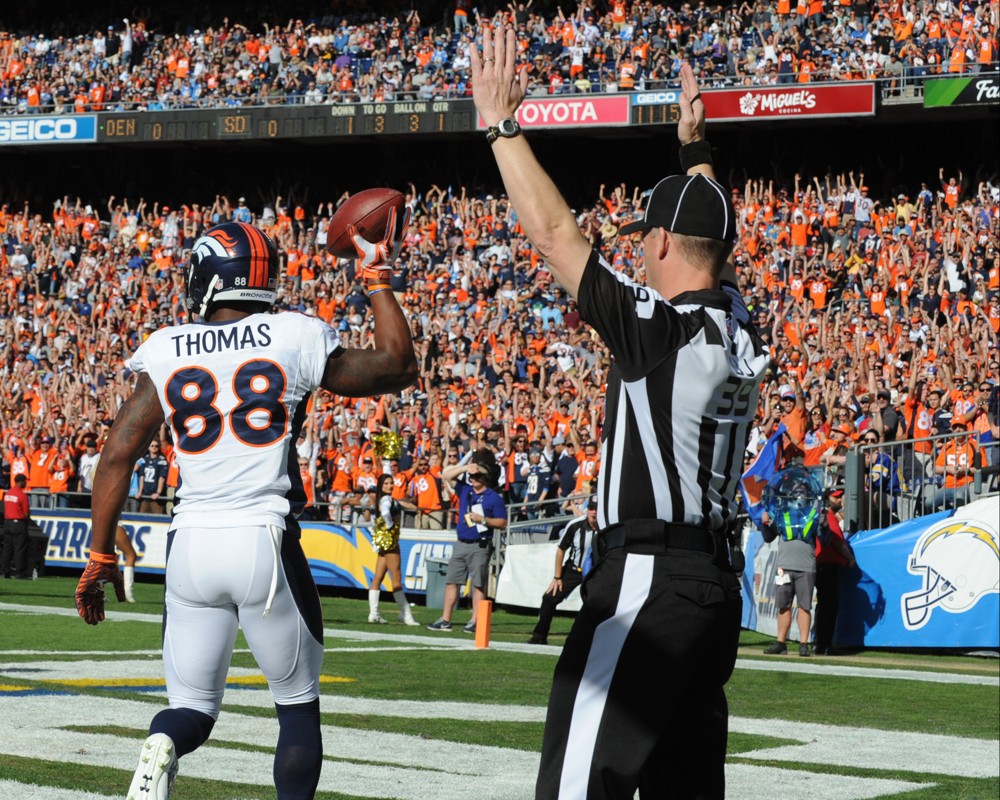 Denver Broncos Wide Receiver Demaryius Thomas scores a touchdown during the NFL football game between the Denver Broncos and the San Diego Chargers at Qualcomm Stadium in San Diego California