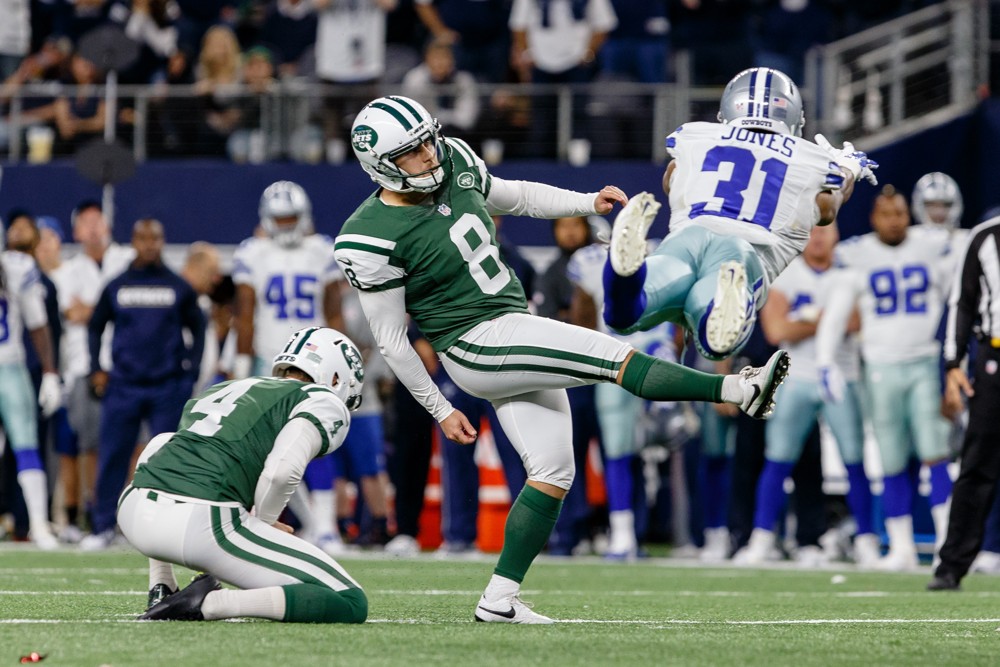 19 DEC 2015 Dallas Cowboys Cornerback Byron Jones  attempts to block the game winning field goal by New York Jets Place Kicker Randy Bullock  during the NFL Saturday Night game between the New York Jets and Dallas Cowboys at AT&T S