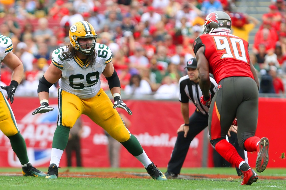 21 DEC 2014 David Bakhtiari of the Packers has his eyes on Michael Johnson of the Buccaneers during the regular season game between the Green Bay Packers and the Tampa Bay Buccaneers at Raymond James Stadium in Tampa Florida