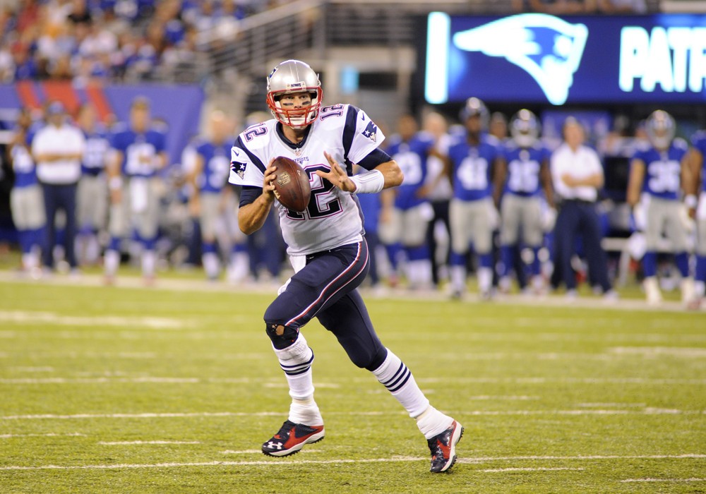 Pigskin News					Patriots Tom Brady plays without NFL shield decal														Bennett Cohen  Icon Sportswire