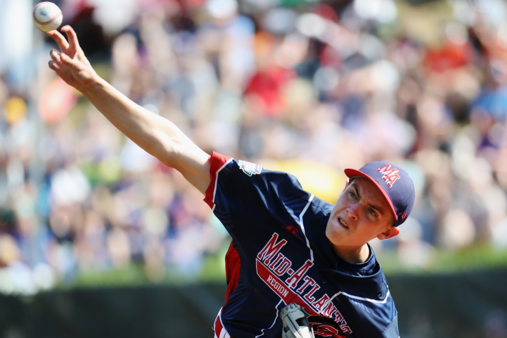 Pitcher Ryan Harlost #19 of the Mid Atlantic Team from New York throws to a batter from the Asia Pacific team from South Korea in the first inning during the Little League World Series Championship Game