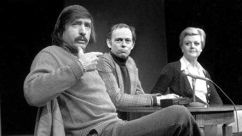 Playwright Edward Albee left makes a point as director Paul Weidner center and actress Angela Lansbury look on 1977. File