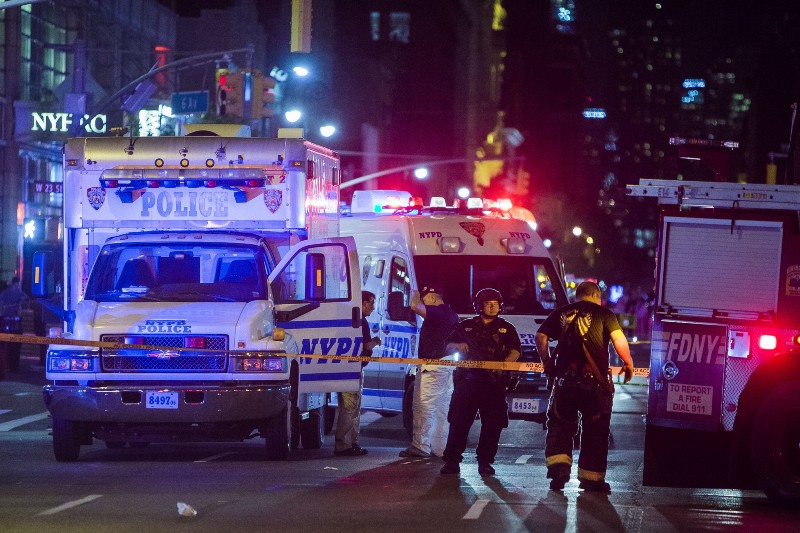 Police and firefighters work near to the scene in Manhattan New York Saturday Sept. 17 2016. CREDIT AP