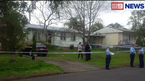 Police at the home in Miller where a two-year-old girl was found dead on Tuesday