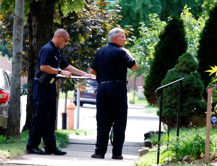 Police officers near the scene of the shooting